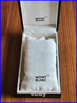 $215 100% Auth Montblanc Key fob/key chain in black leather with iconic star