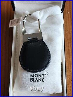 $215 100% Auth Montblanc Key fob/key chain in black leather with iconic star