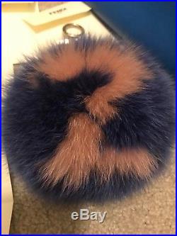 AUTHENTIC Fendi Bag Charm in black fox fur with a peach letter C