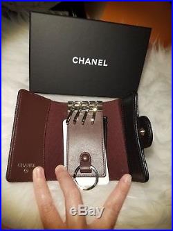 Authentic CHANEL 4 ring key holder. Black caviar with light gold hardware