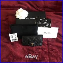 Authentic CHANEL six ring key holder. Black caviar with gold hardware