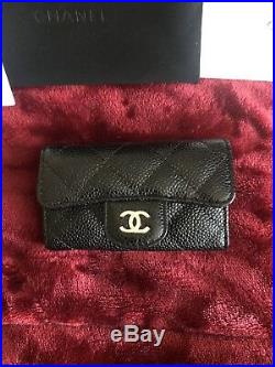 Authentic CHANEL six ring key holder. Black caviar with gold hardware