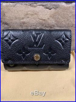 Authentic Louis Vuitton 6 Key Holder in Black Emprente Leather