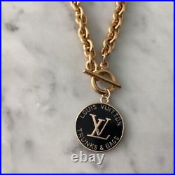 Authentic Louis Vuitton Black Trunks and Bag Charm- Taken from a key/bag chain