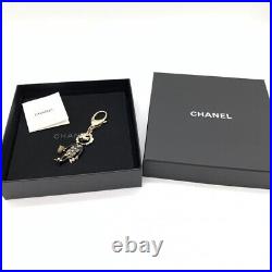 CHANEL Key Chain Back Charm Lion Motif Coco Rhinestone Gold Black With Box