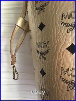MCM M/L tote gold w black design gold leather pre owned NWOT serial # & sleeper