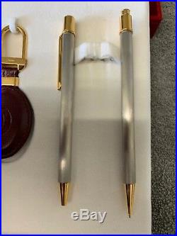 Must de Cartier Stainless Steel and Gold Pen, Pencil and Leather Key Chain Set