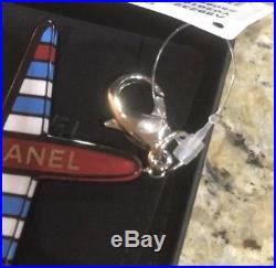 NWT Chanel Black/Red/Blue 16s Airplane Keychain