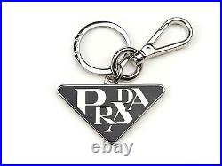 PRADA Black Enameled Triangle Stylized Logo Steel Keychain NIB